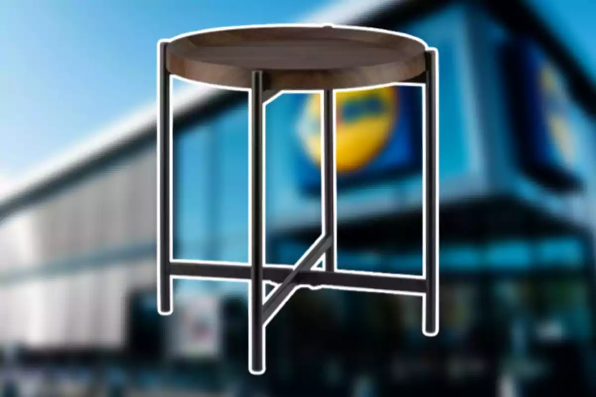 Round wooden side table with metal legs in front of a blurred store Round wooden side table with metal legs in front of a blurred store