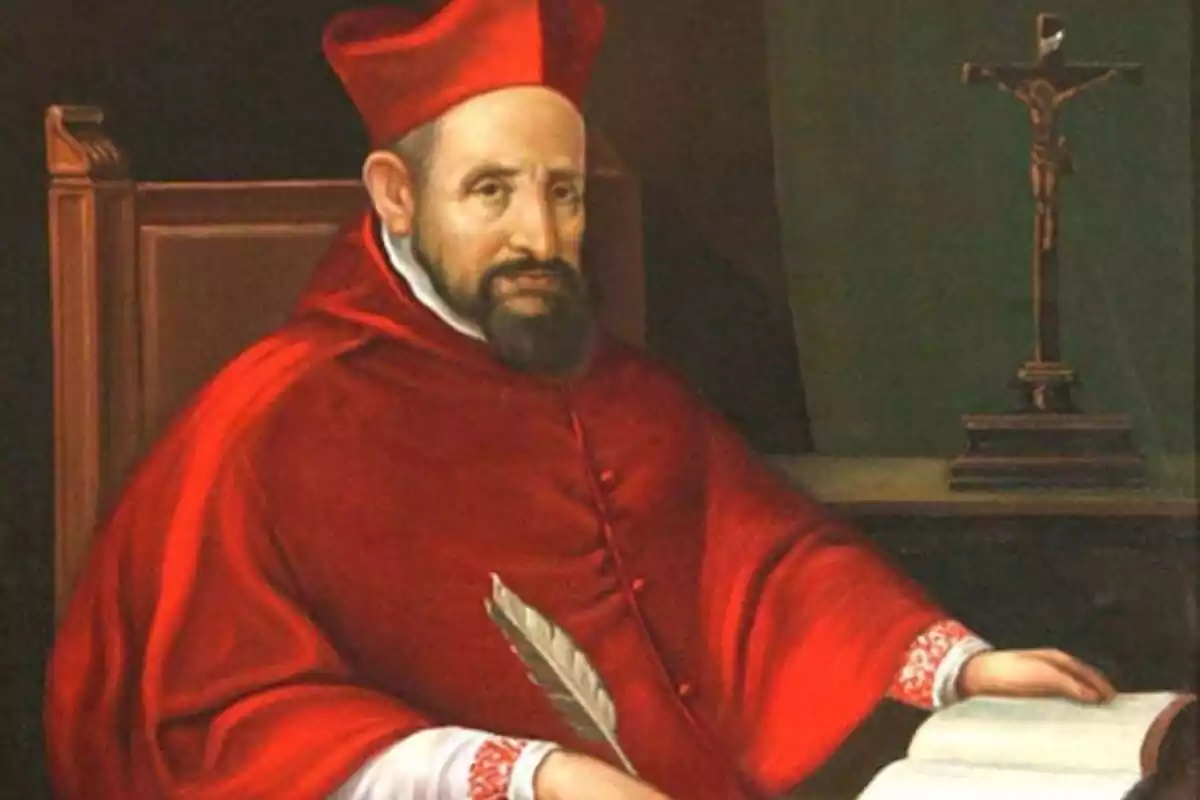Retrato de San Roberto Belarmino escribiendo con una pluma en un libro